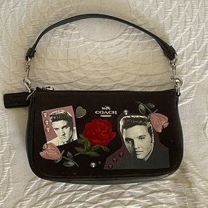Elvis wristlet by coach. Handbag